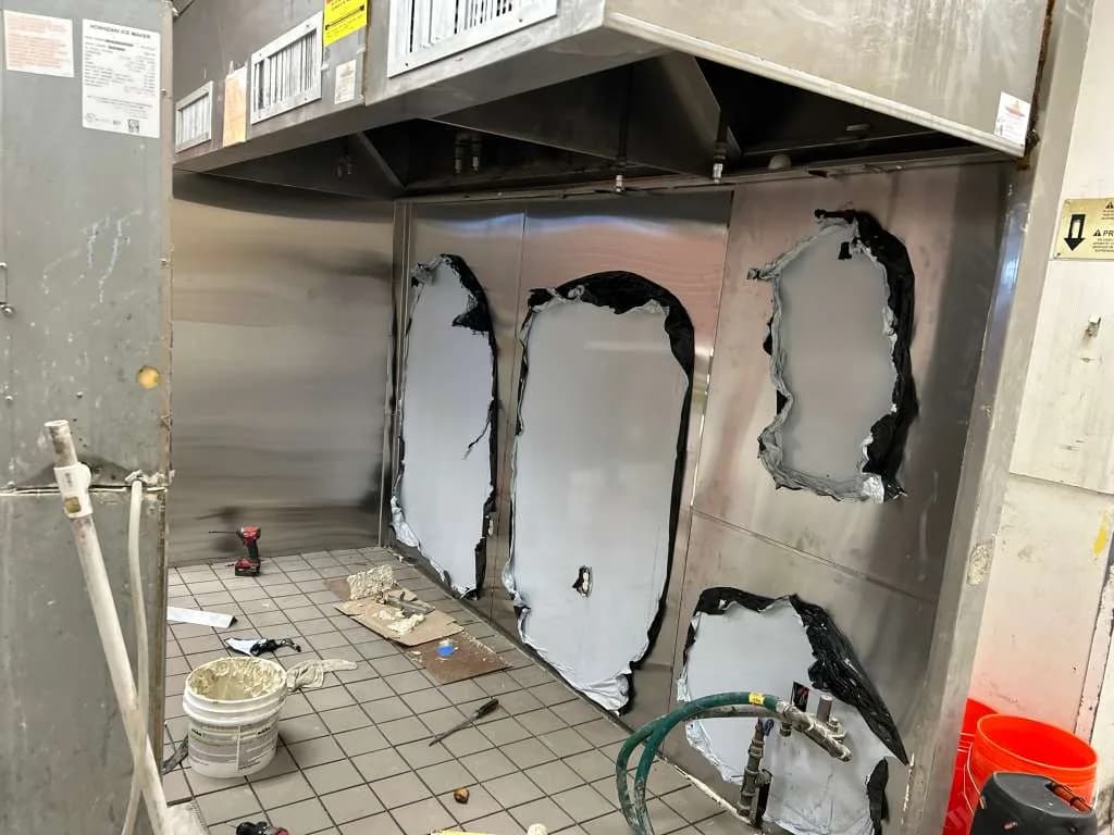 Commercial exhaust hood repair and panel work in Maryland kitchen