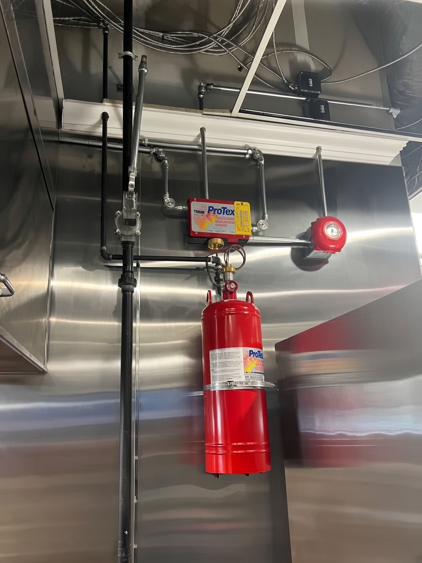 Kitchen fire system Maryland wet chemical nozzles under commercial hood